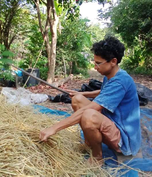 Volunteer working on the farm